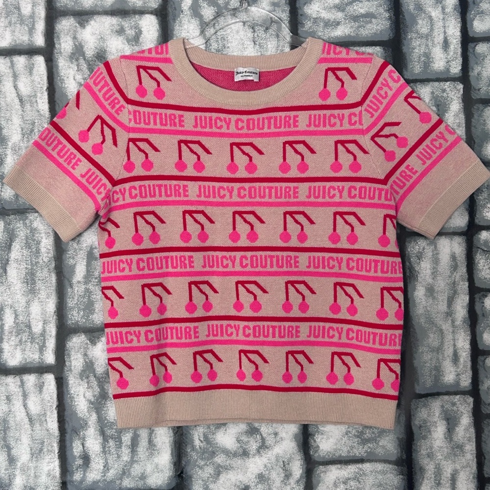 Juicy Couture piece featuring an all-over cherry and logo print